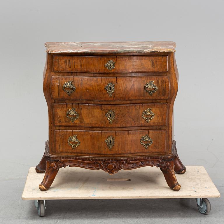 A 19th Century rococo style chest of drawers.