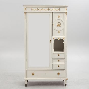 A Gustavian style wardrobe, first half of the 20th Century.