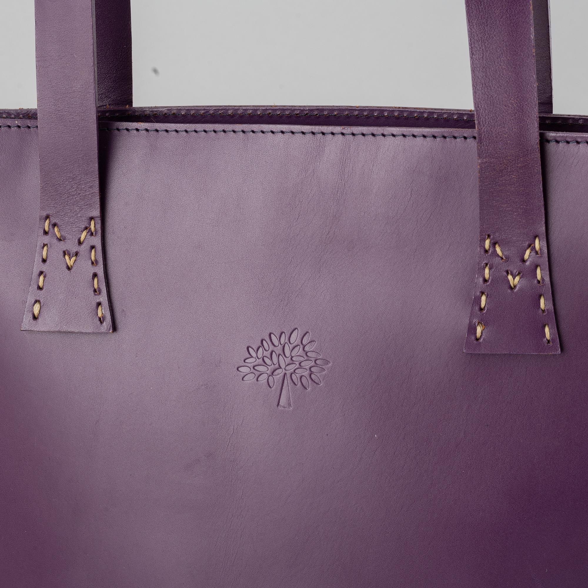 Mulberry, a purple leather handbag.