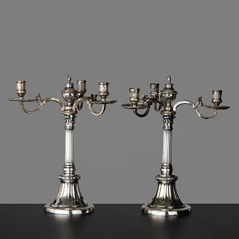 107. A pair of Gustavian three-light candelabra by Johan Gustaf Ahlgren, Stockholm 1777.