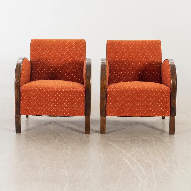 A pair of 1930/40:s Art Deco easy chairs.