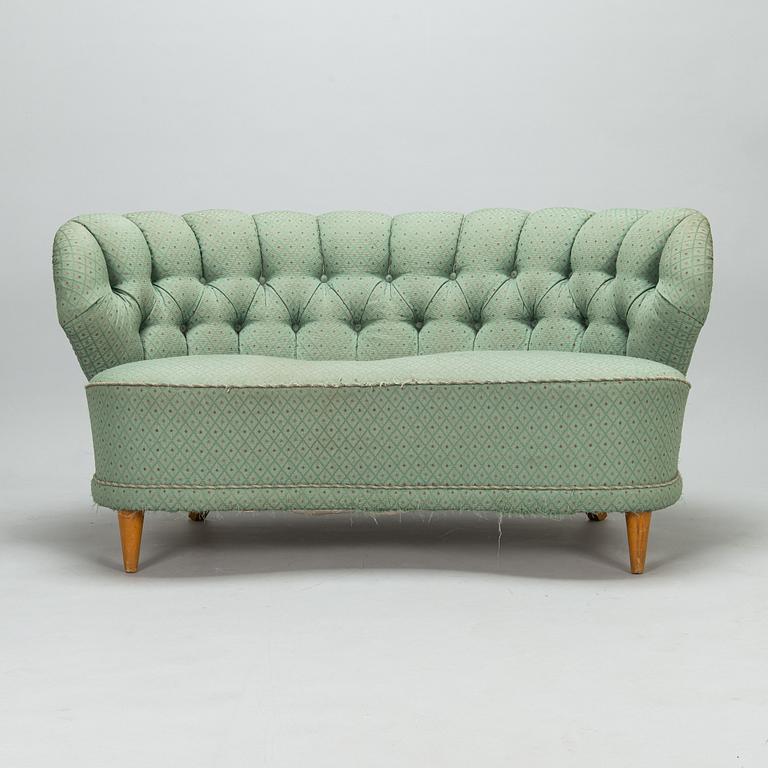 A mid-20th-century sofa.