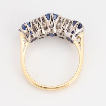 Sapphire and brilliant-cut diamond ring.