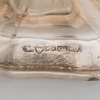 A silver coffee pot, sugar bowl, cream jug, and sugar tongs, Finland 1926-49.