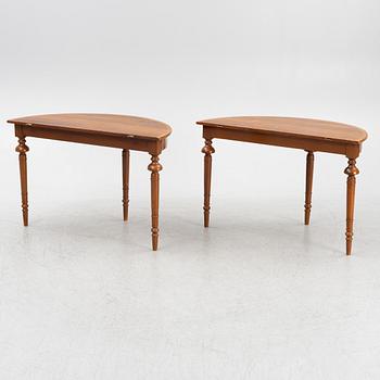 A dining table, circa 1900.