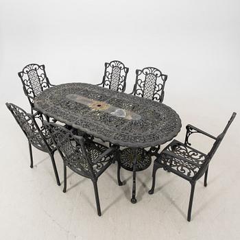 A seven pcs metal garden suit later part of the 20th century.