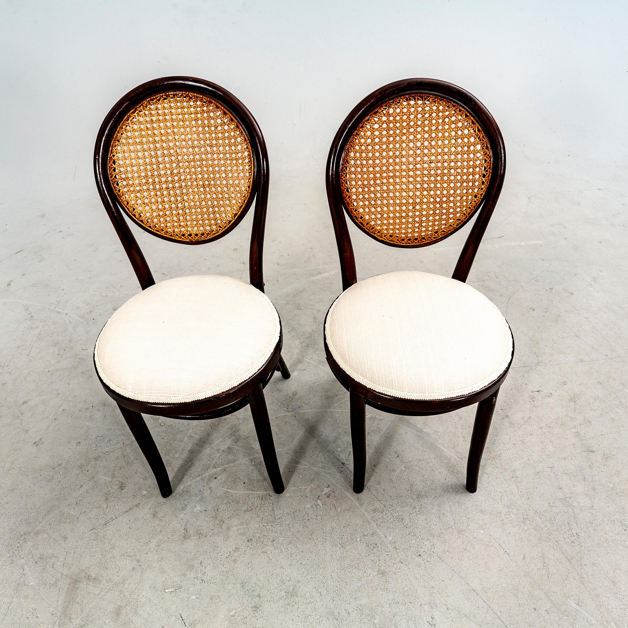 A set of four stained wood chairs, first half of the 20th century.