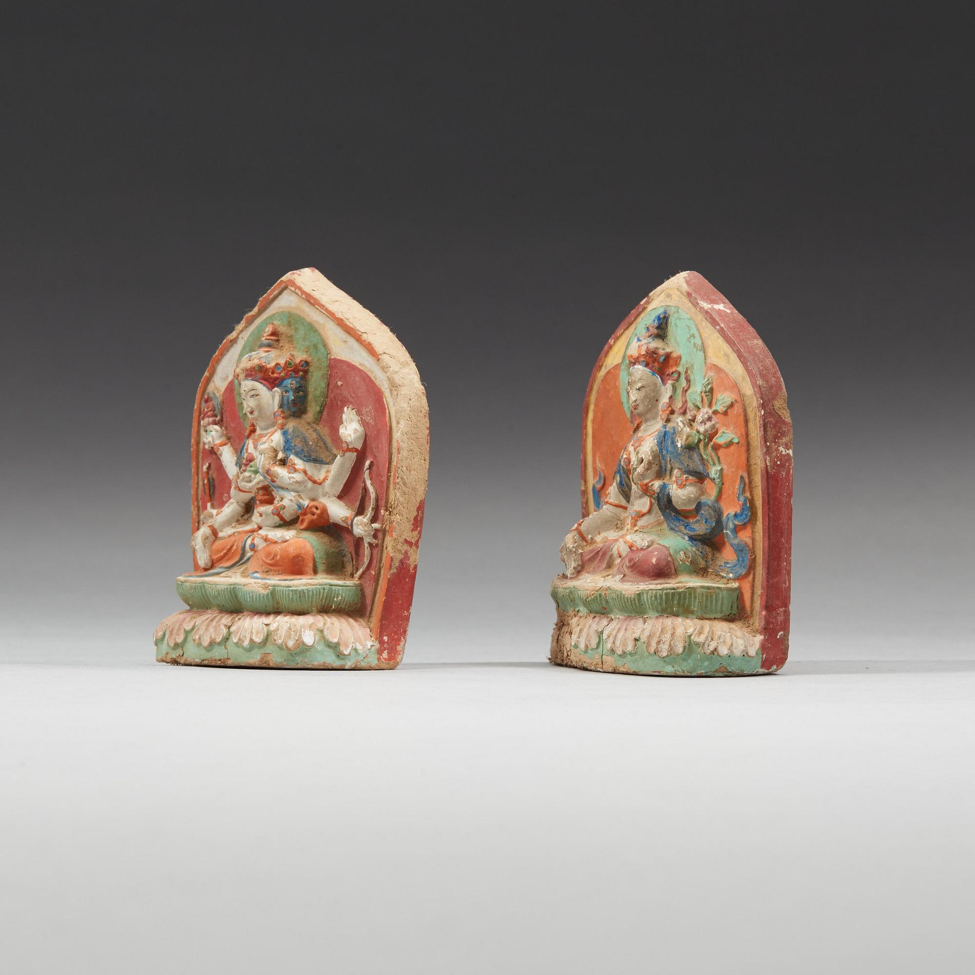 Two clay tsa-tsas, Tibet, 18/19th Century.
