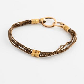 Hairwork bracelet clasp in 18K gold with Swedish hallmarks.