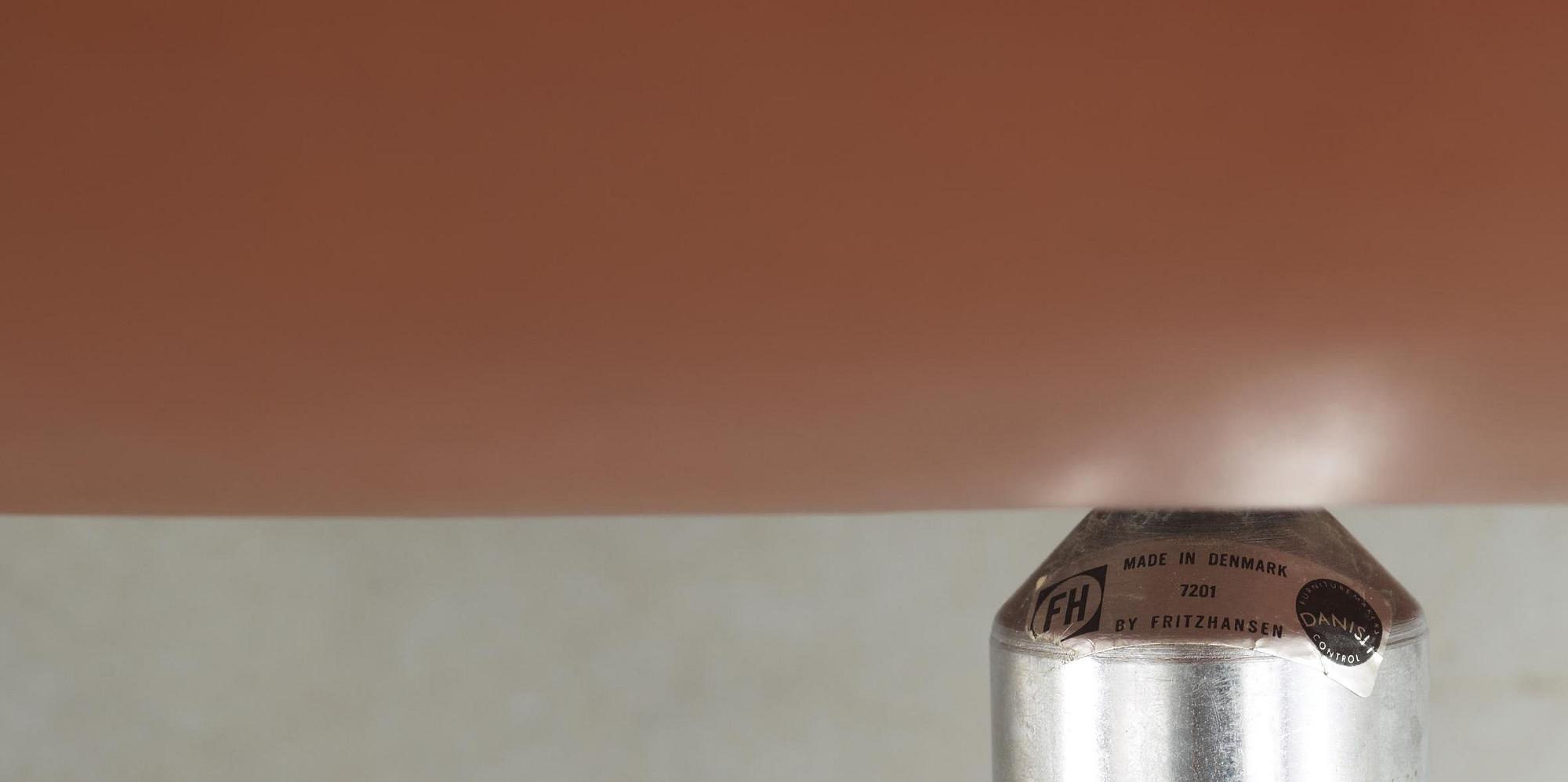 A pair of Arne Jacobsen brown leather 'Swan' chairs, Fritz Hansen, Denmark 1972.
