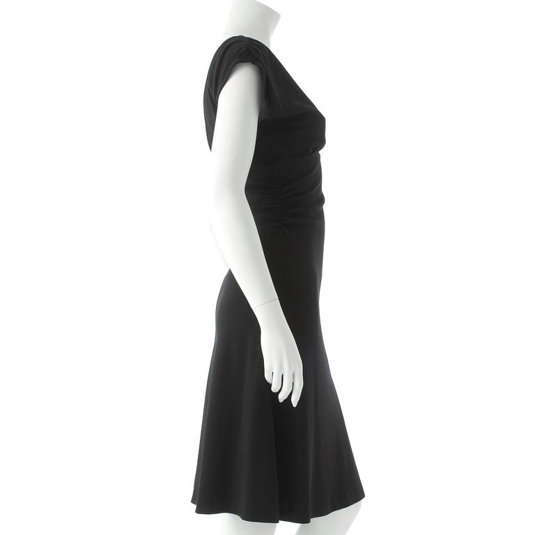 DIANE VON FURSTENBERG, a black wool dress.