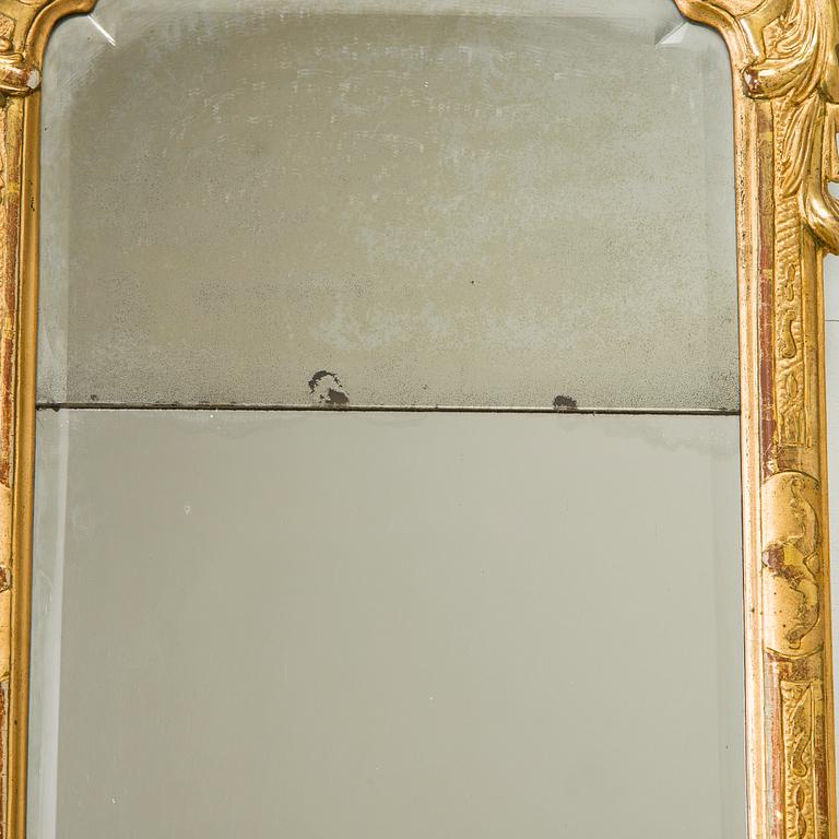 A Rococo giltwood mirror by Nils Meunier (master in Stockholm 1754-97, royal court mirror maker 1769).