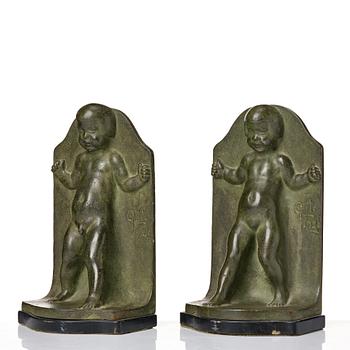 Axel Gute, a pair of green patinated metal bookends, Sweden, dated 1920.
