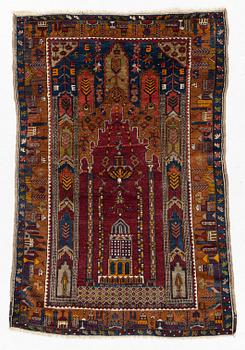 An antique rug, possibly Anatolian, approx. 170 x 102 cm.