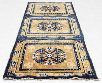 An antique Ningxia meditation rug, north west China, c 189 x 63 cm.