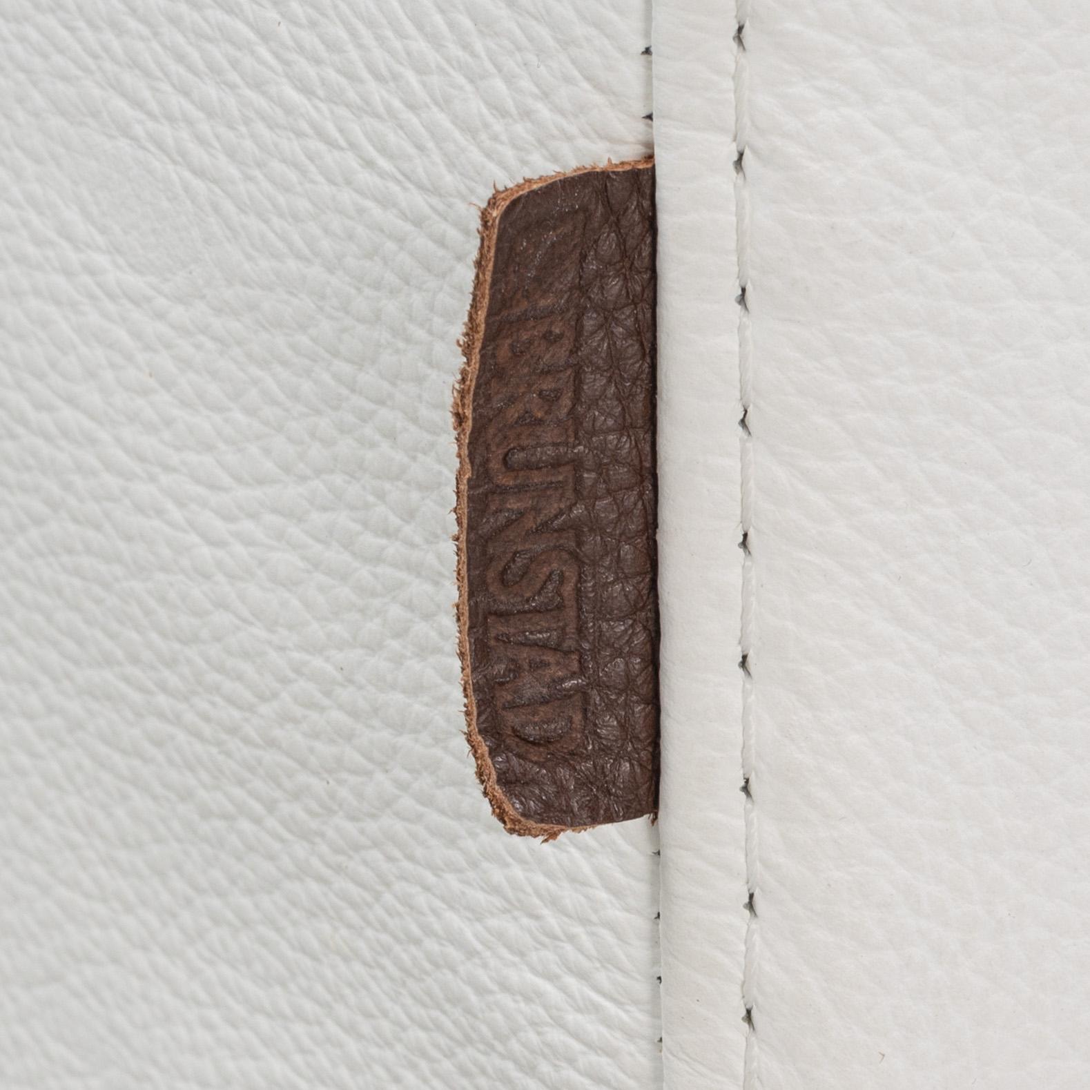Helge Taraldsen, an 'Amanda' leather easy chair and ottoman, Brunstad, Norway, 2014.