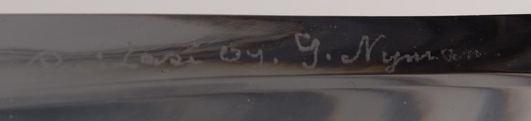 A "Facett I" glass dish signed G. Nyman, Riihimäenlasi Oy from the 1940s.