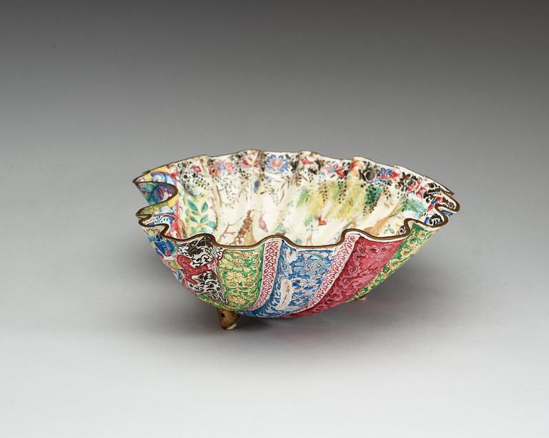 An enamel on copper clam-shaped bowl, Qing dynasty, 18th Century.