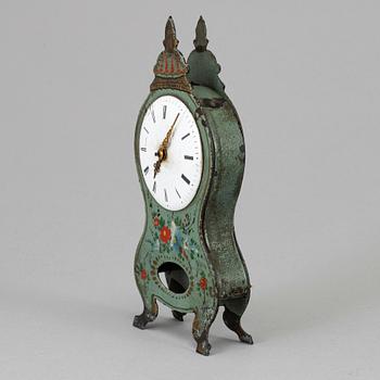 A 19th century tin plate miniature table clock.