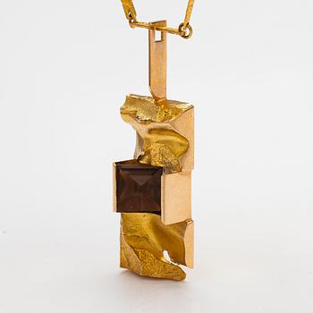 Björn Weckström, "Janus", a 14k gold necklace with a smoky quartz and rock crystal. Lapponia 1972.