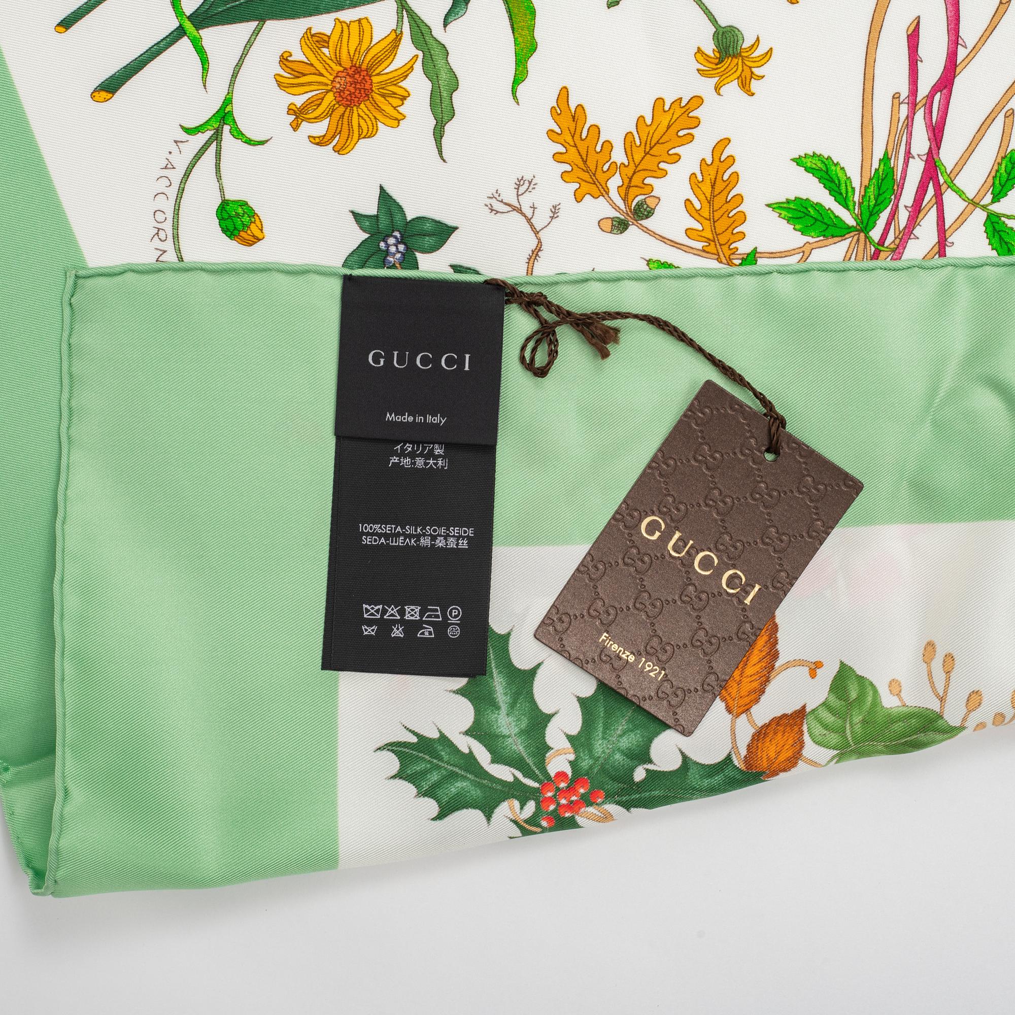 Gucci, a 'Flora' silk scarf.