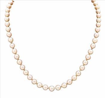 A necklace of cultured pearls, clasp of 18K gold, cabochon cut aquamarine and seed pearls, Atelier Ajour Stockholm 1963.