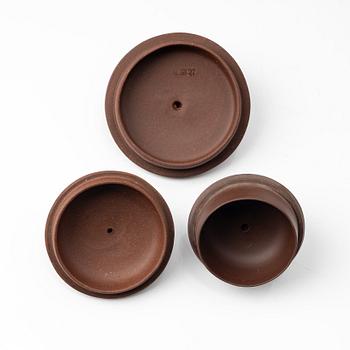 A group of three Chinese yixing teapots, 1960-80s.