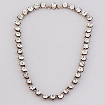 A  RIVIERE NECKLACE, facetted glass, silver, 19th century.