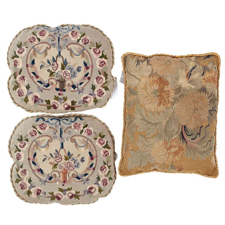 CUSHIONS, 3 pcs., one rectangular in tapestry weave, two oval embroidered, ca 51,5 x 42 cm, ca 38,5 x 45,5 cm each,