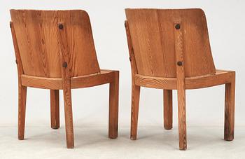 A pair of Axel Einar Hjorth 'Lovö' stained pine armchairs, Nordiska Kompaniet, 1930's.