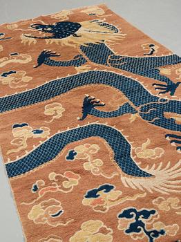 A PILLAR CARPET, an antique Ningxia figural, China late Qing, ca 304 x 130-170 cm.