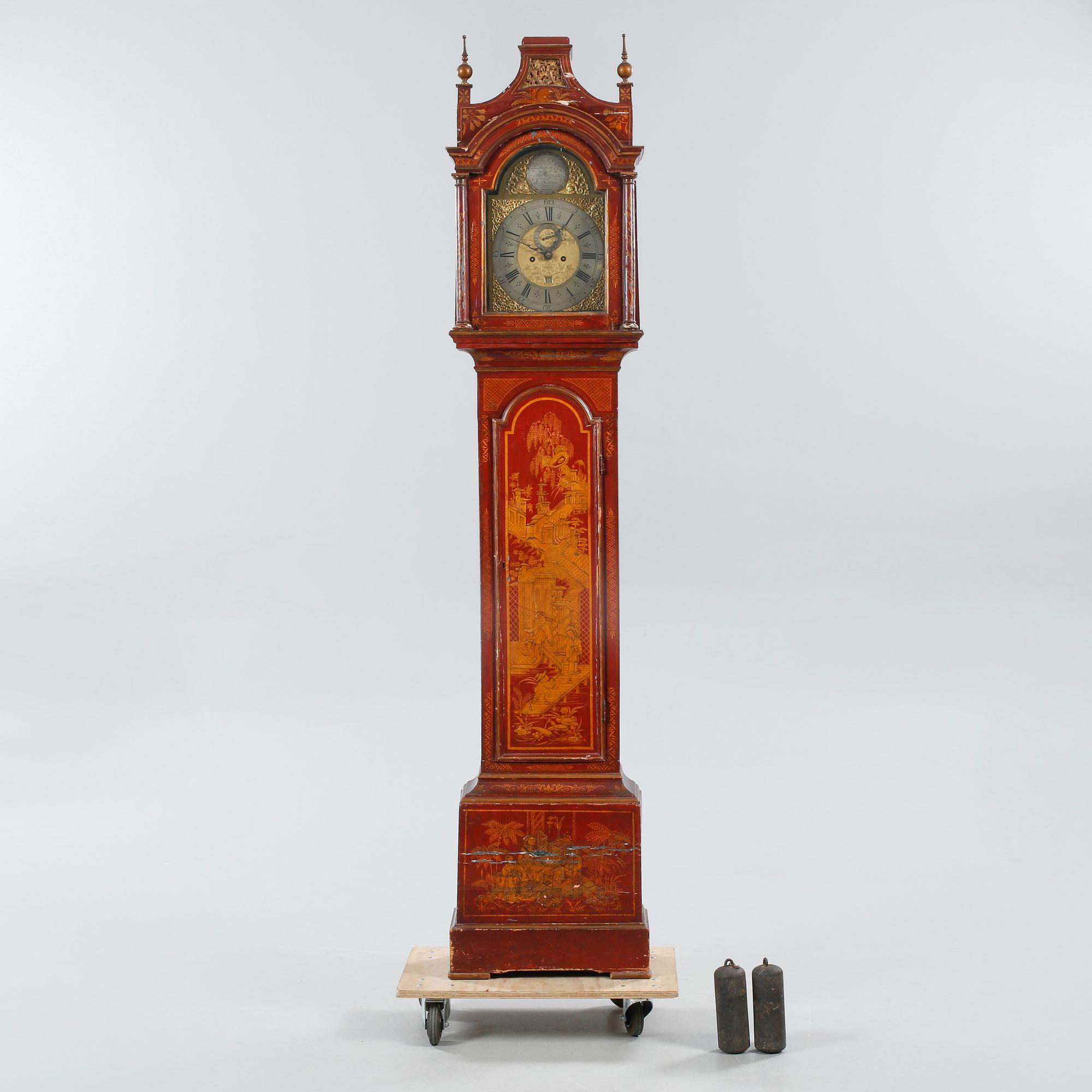 A grandfather clock, dial marked "John Thompson, England", 19th century.