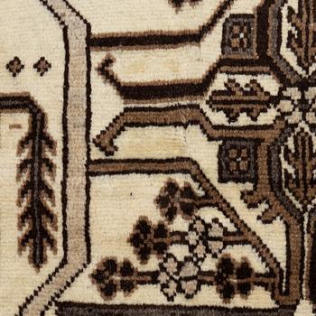 A Ferdos carpet, c. 295 x 210 cm.