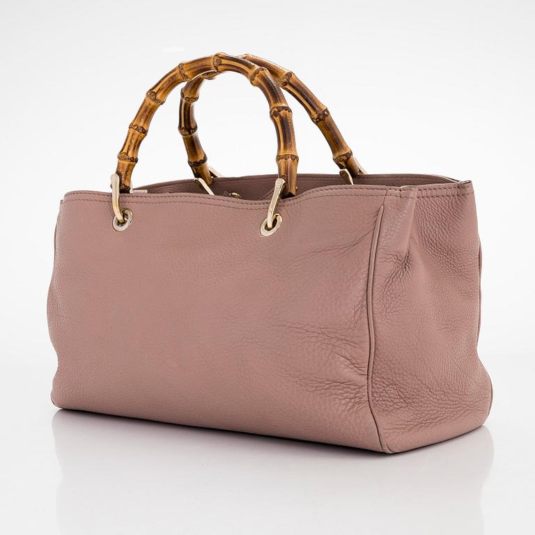 Gucci, a 'Bamboo shopper' bag.