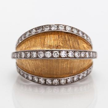 An 18K gold bombé ring with diamonds. CF Carlman, Stockholm.