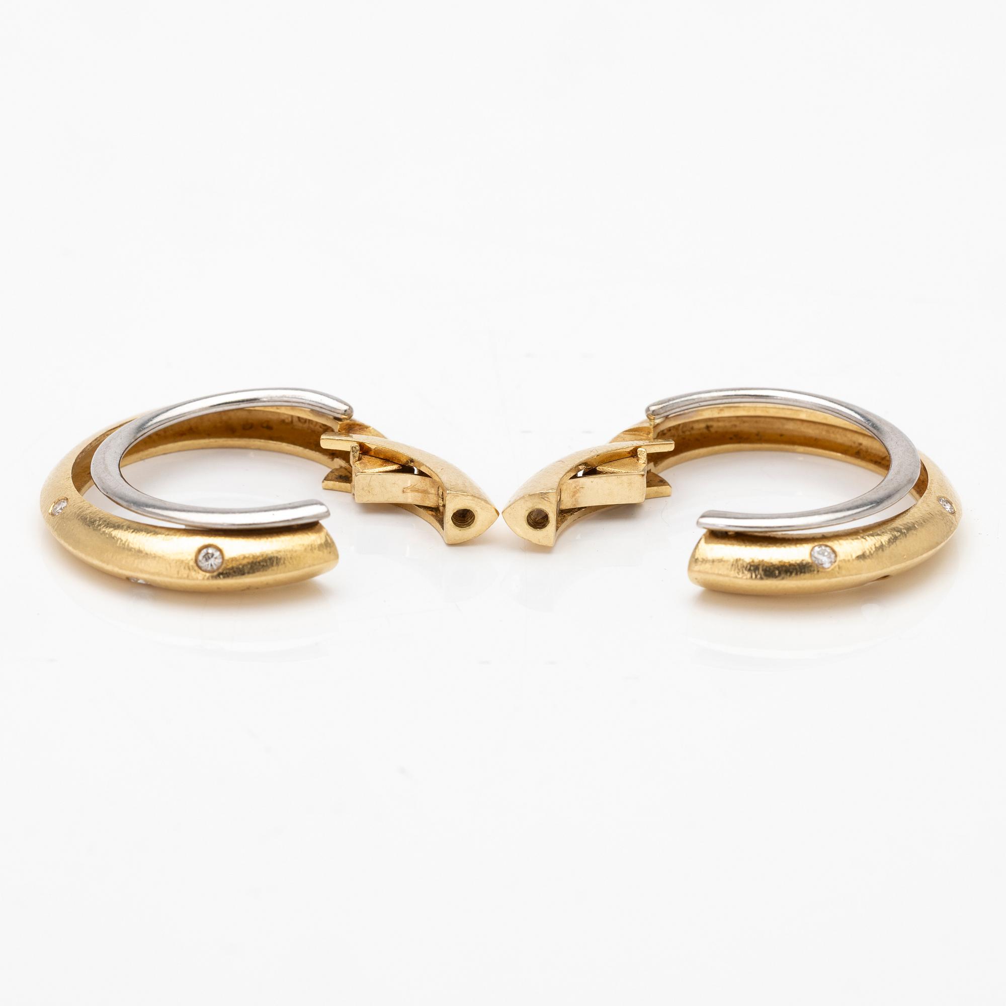 Ole Lynggaard, 18K gold and diamond hoop earrings.