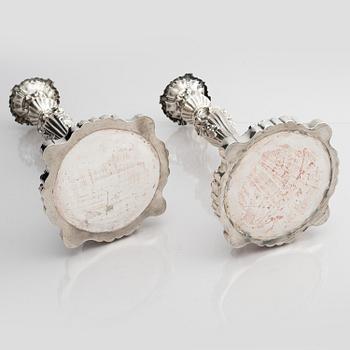 A pair of silver candlesticks, marks Gustaf Möllenborg, Stockholm 1845.