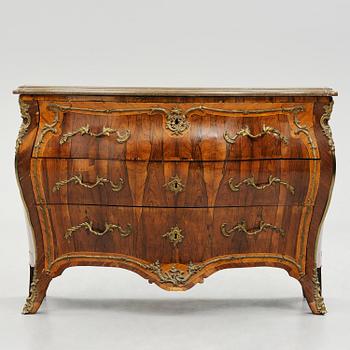 A rococo parquetry commode by C. G. Willkom (master in Stockholm 1763-65).
