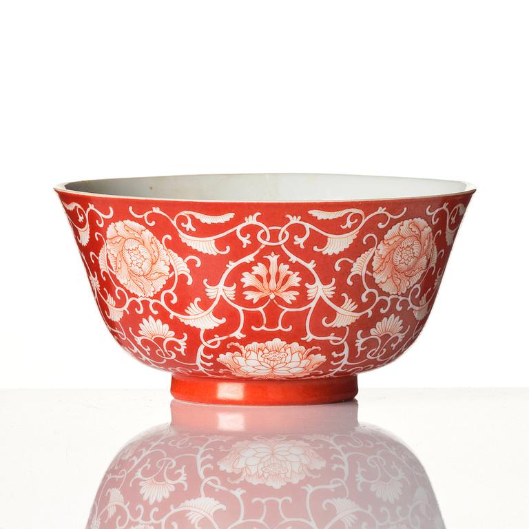 A coral red reverse decorated floral bowl, seal mark of Daoguang, Republic, 20th century.