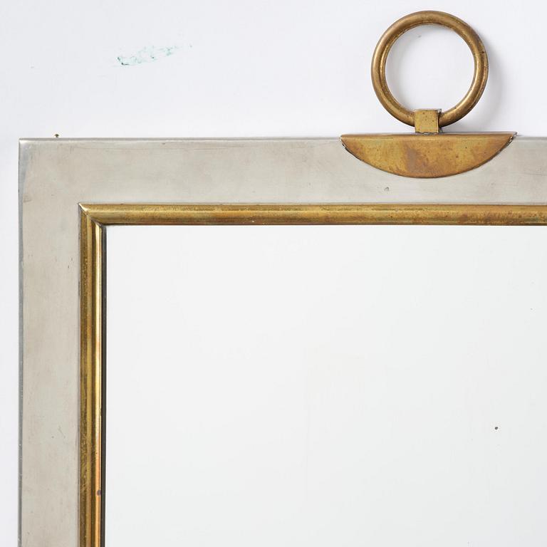 Firma Svenskt Tenn, a pewter and brass wall mirror model 2283, Firma Svenskt Tenn, Stockholm, 1952.