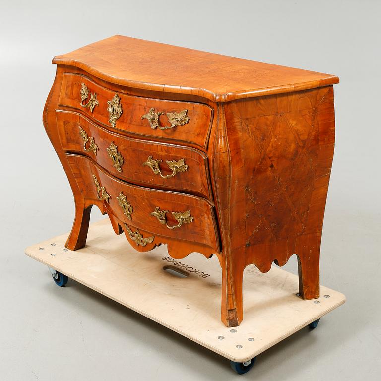 A Rococo bureau from the 18th century.