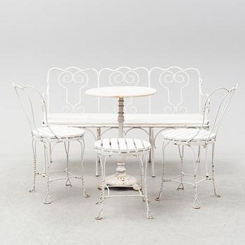 A matched five piece suite of garden furniture, 20th Century.