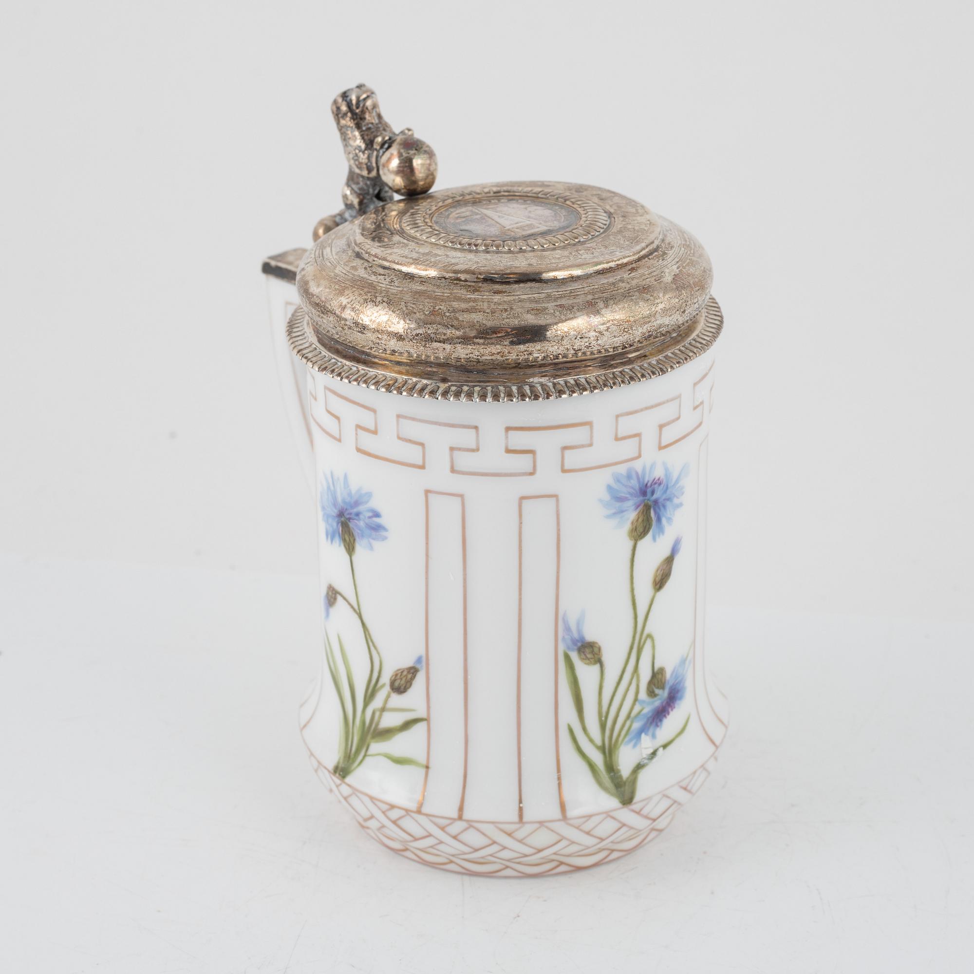 A porcelain tankarnd with older silver mounted lid, Royal Copenhagen, Denmark, 1889-1922.