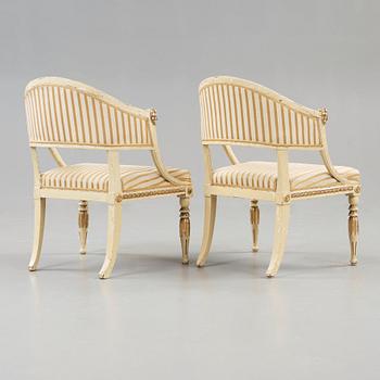 A pair of late Gustavian early 19th century armchairs.