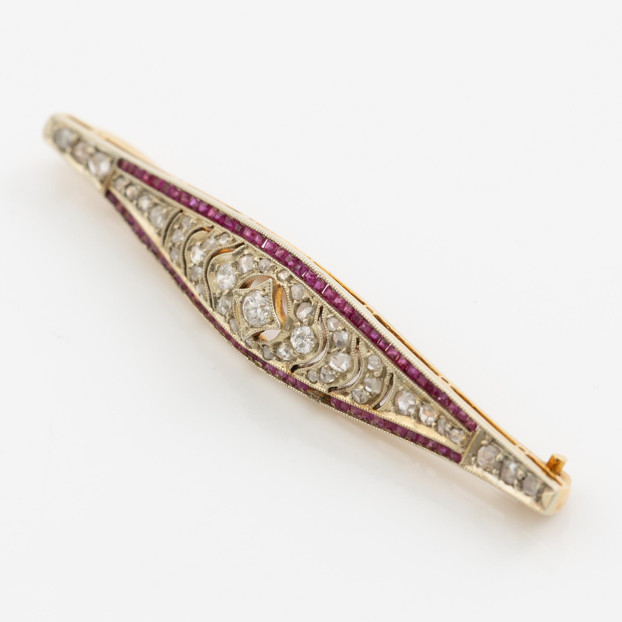 Brooch, 18K gold set with rose-cut and old mine-cut diamonds and probably synthetic rubies, circa 1900.