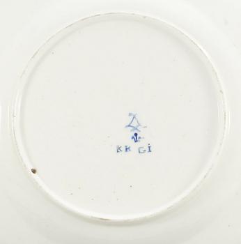 A Sèvres lobed plate, 18th century, with painter´s mark Madame Taillandier. Gilders mark for E-G Girard.