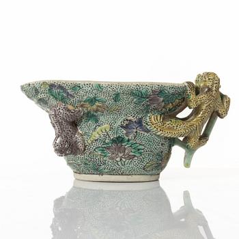 A famille verte bisquit wine cup, Qing dynasty, Kangxi (1662-1722).