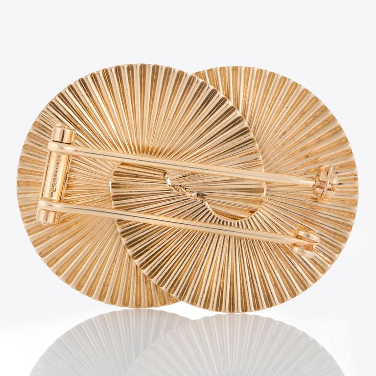 En Cartier Retro brosch.