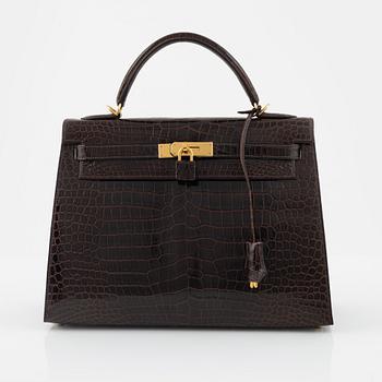 Hermès, a Crocodile Porosus 'Kelly 32' handbag, 2009.