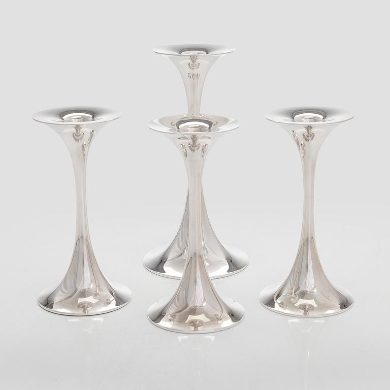 Tapio Wirkkala, A set of four silver candlesticks, "Trumpetti", Kultakeskus, Hämeenlinna 1979 and 1990.